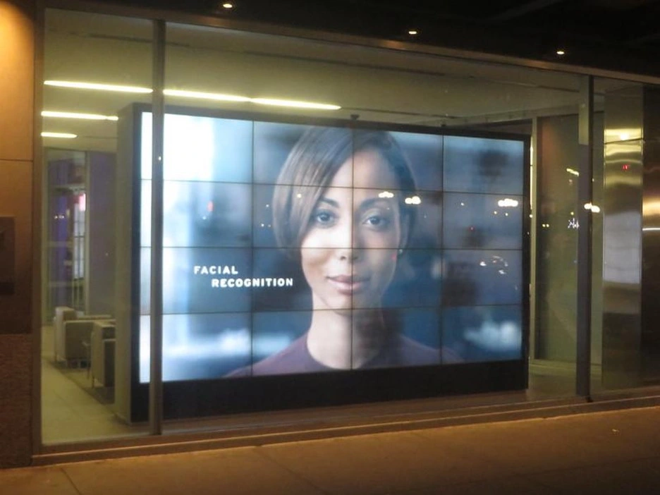 Face of Woman with text facial recognition next to it