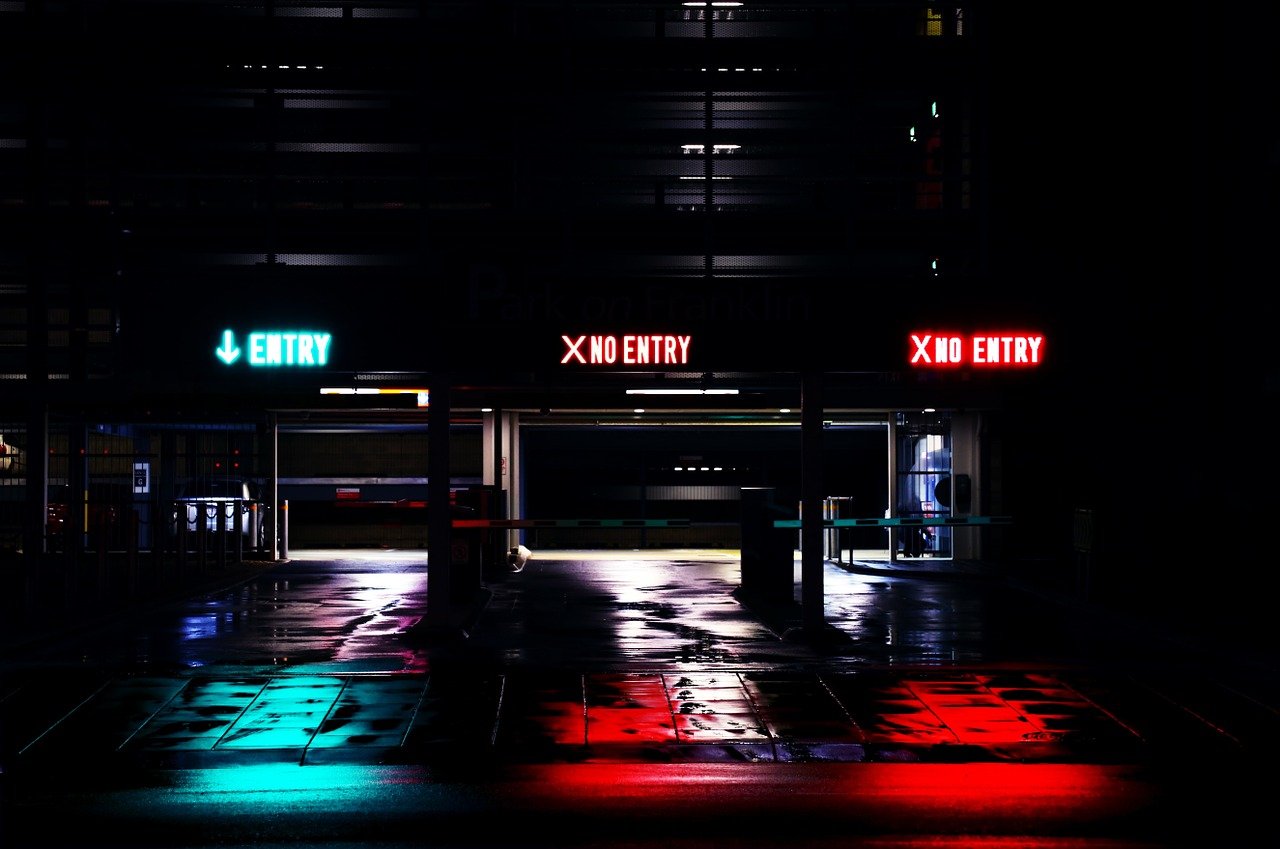 Parking garage entry and exits with signs
